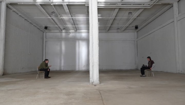 Raw ground-floor space with projector and projection placement